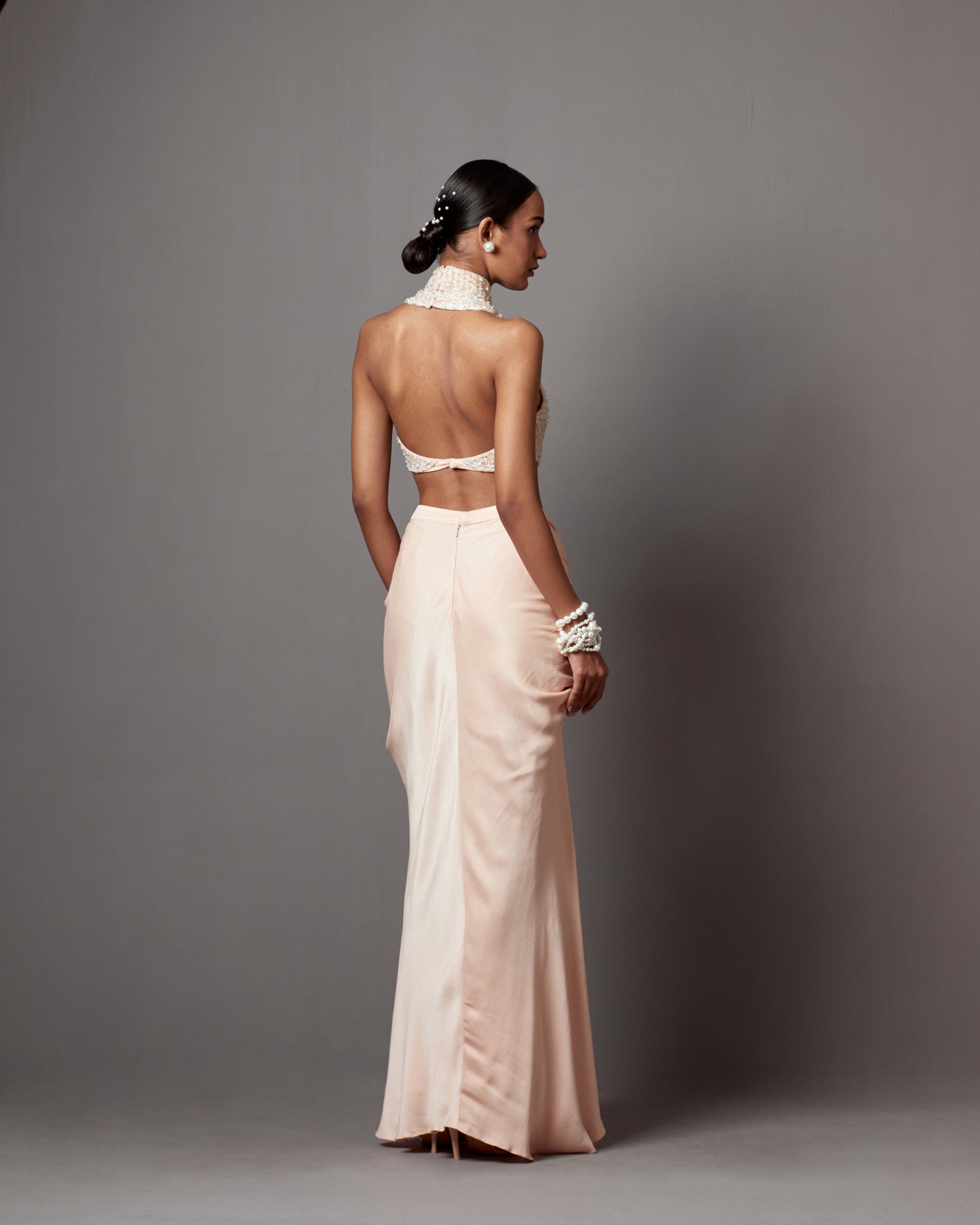 Meghana Kaur in Pastel Pink Dull Crepe Satin Wrap Skirt Set