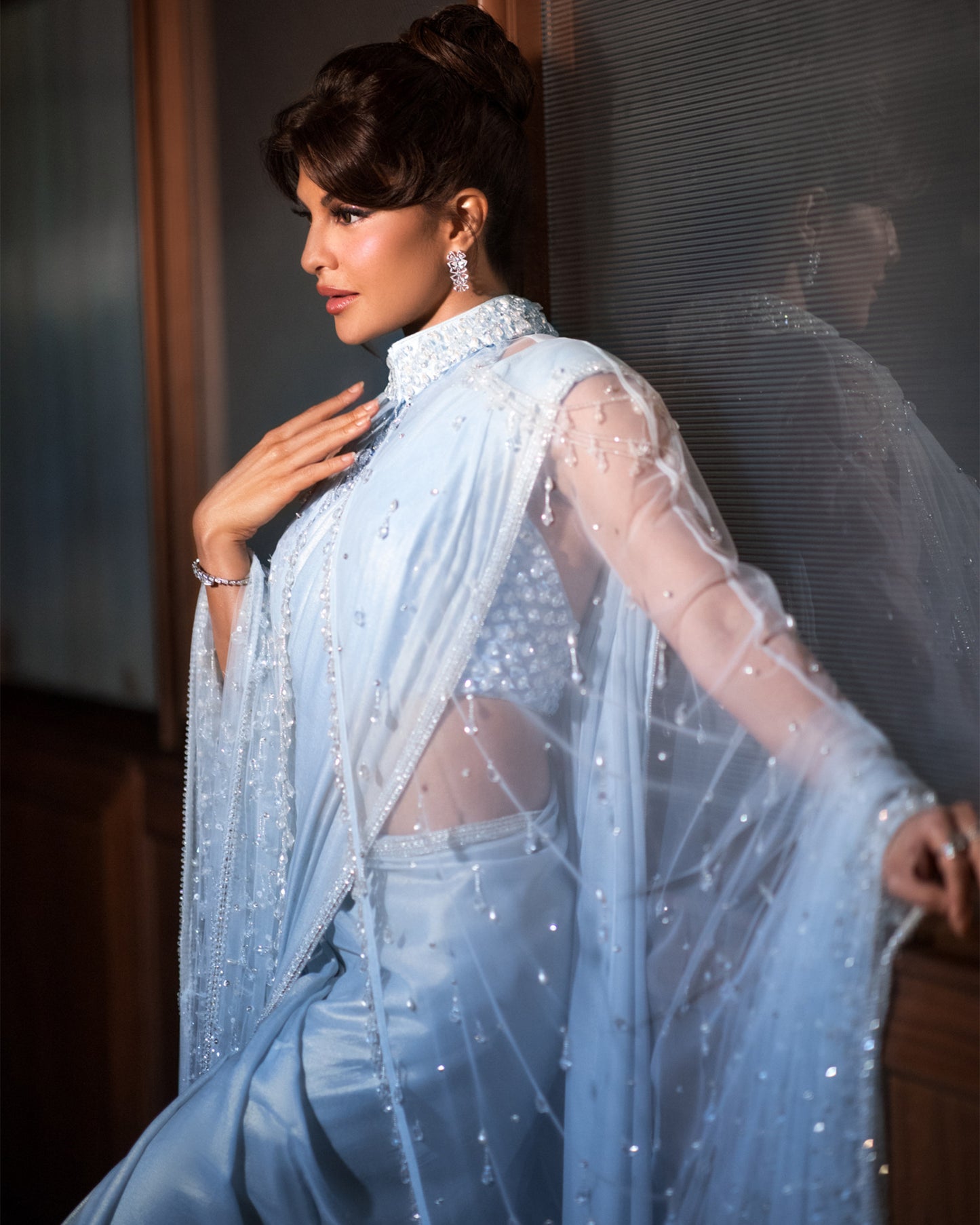 Jacqueliene Fernandez in Blue Georgette Embroidered Saree Set