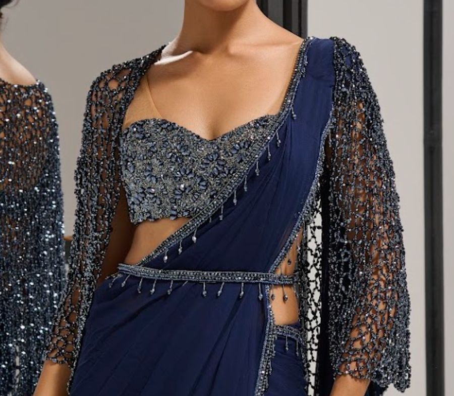 Navy blue saree set with
crystal cape