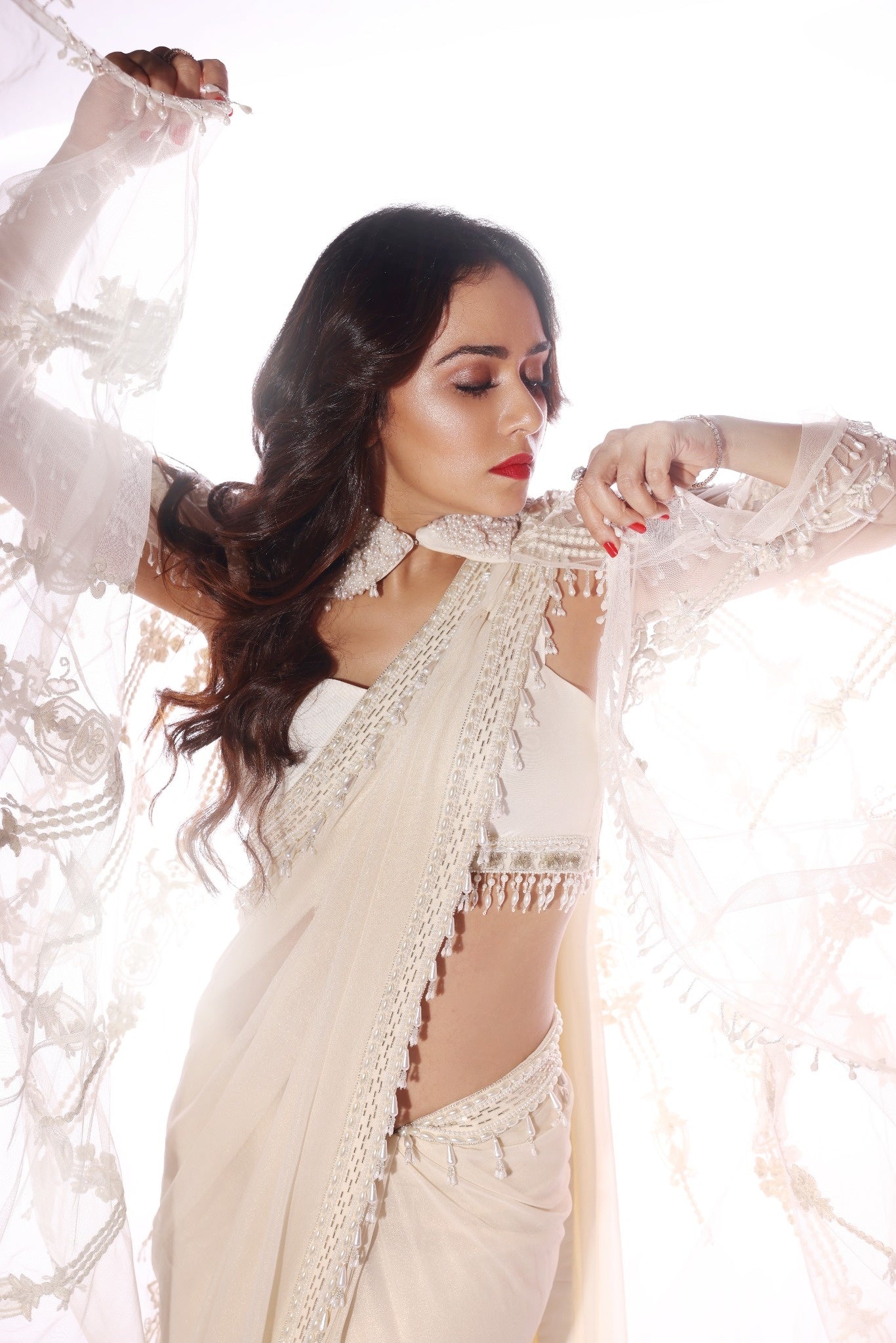 Amruta Khanvilkar in Our Ivory Opaline Cape Saree Set